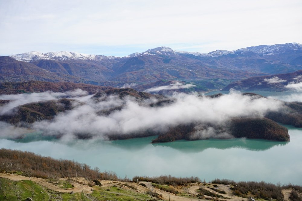 A cloudy sky over Bovilla Lake one of the serene places to visit in Albania