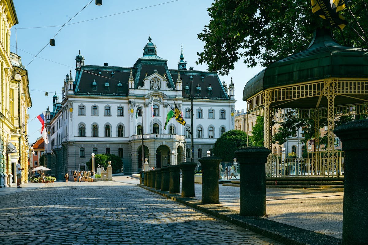 Discover the charm of a cobblestone street in Ljubljana - a must-visit for those exploring the vibrant city.