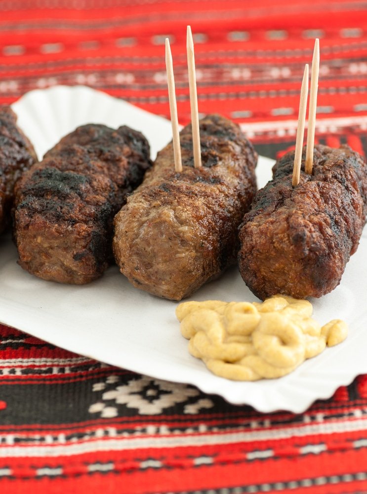 Meat rolls romanian mici mititei with mustard