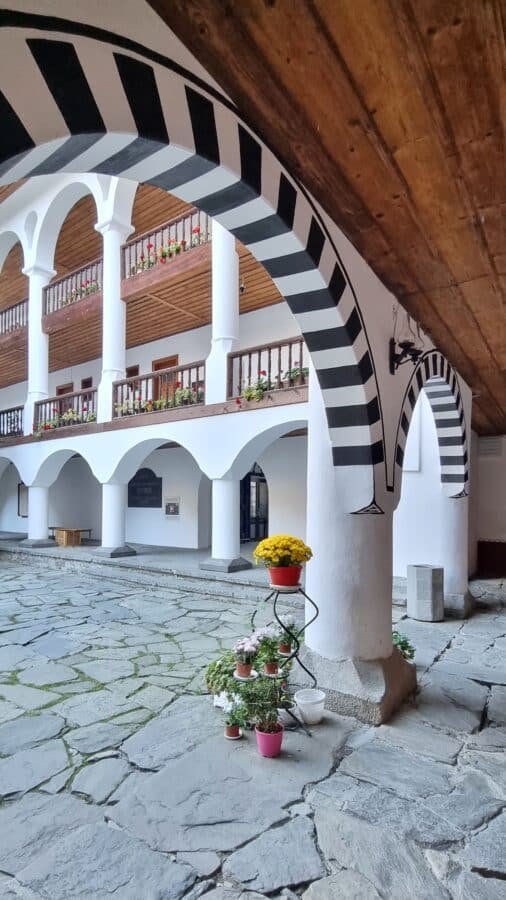 Rila Monastery black and flowers